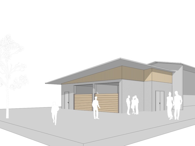 Architekturvisualisierung des geplanten Heizhauses auf Gut Tangstedt: eingeschossiges Gebäude mit Ziegelfassade, Holzelementen und Satteldach.